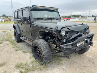 2016 Jeep Wrangler Unlimited Sport - Exterior Front Right Corner Image