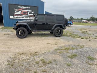 2016 Jeep Wrangler Unlimited Sport - Exterior Side Driver Image