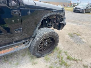 2016 Jeep Wrangler Unlimited Sport - Primary Damage Left Image