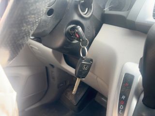2011 Honda Odyssey Touring - Interior Steering Wheel With Keys Image
