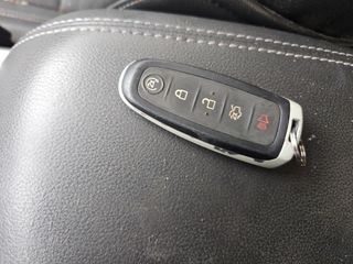 2016 Ford Escape Titanium - Interior Steering Wheel With Keys Image