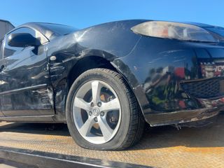 2006 Mazda Mazda3 i Touring - Exterior Front Right Corner Image