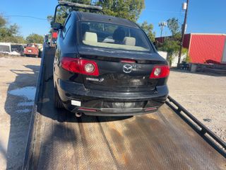 2006 Mazda Mazda3 i Touring - Exterior Rear Center Image