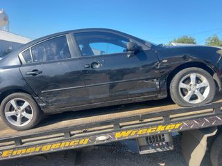 2006 Mazda Mazda3 i Touring - Exterior Side Passenger