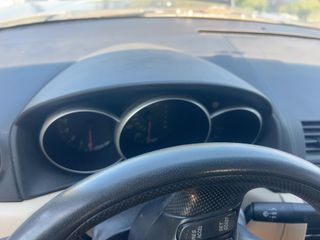 2006 Mazda Mazda3 i Touring - Interior Instrument Cluster / Odometer Image