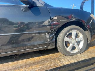 2006 Mazda Mazda3 i Touring - Primary Damage Straight On Image