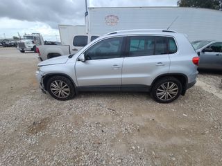 2010 Volkswagen Tiguan SEL - Exterior Side Driver Image
