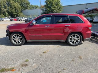 2014 Jeep Grand Cherokee Summit - Exterior Side Driver Image