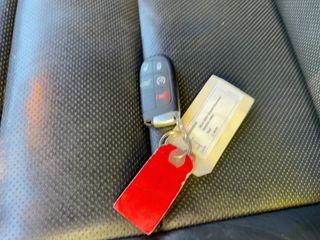 2014 Jeep Grand Cherokee Summit - Interior Steering Wheel With Keys Image