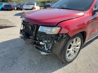 2014 Jeep Grand Cherokee Summit - Primary Damage Left Image