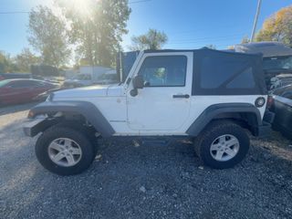 2013 Jeep Wrangler Sport - Exterior Side Driver Image