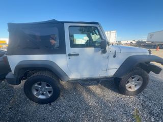 2013 Jeep Wrangler Sport - Exterior Side Passenger
