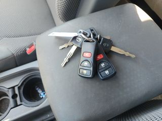 2014 Nissan Frontier SV - Interior Steering Wheel With Keys Image
