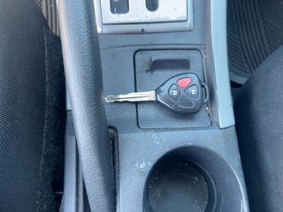 2006 Toyota Scion tC 2.5 SR - Interior Steering Wheel With Keys Image