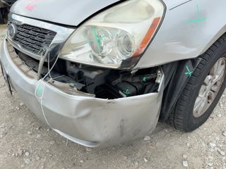 2012 Kia Sedona LX - Primary Damage Left Image